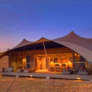 A tent on the African plains at dusk