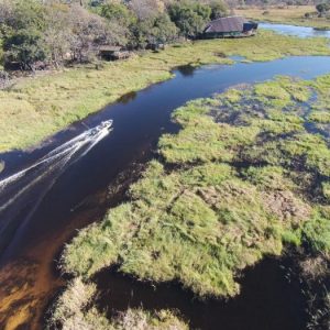 Boat on water at Moremi Crossing lodge in the Okavango Delta