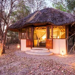 A small thatched chalet at Nanzhila Plains Camp