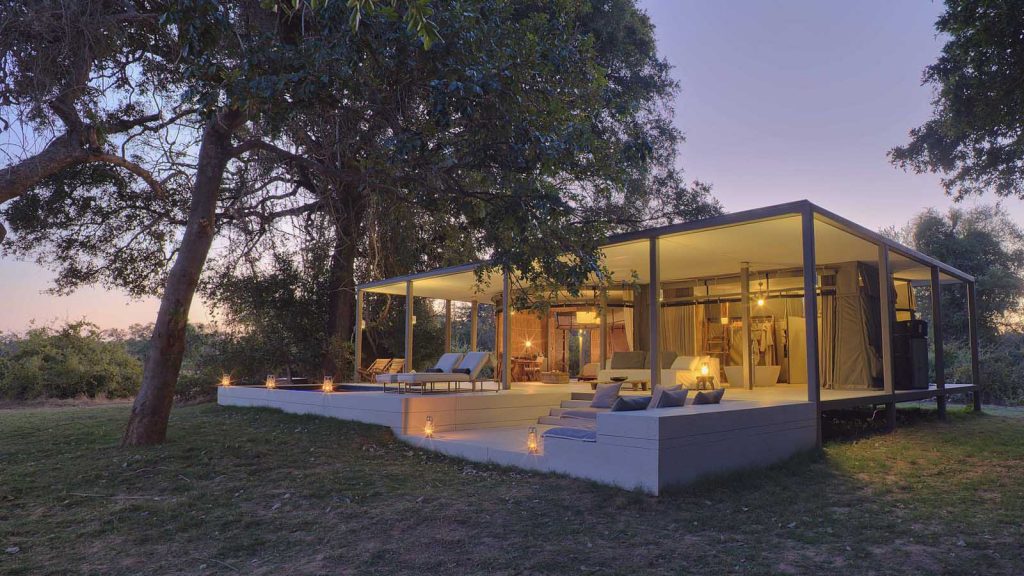 A small house under trees' at Chinzombo Camp